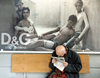 ELDERLY MAN READING A PAPER - VENICE, ITALY